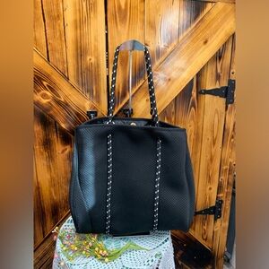 Chic Black Tote with Polka Dot Straps